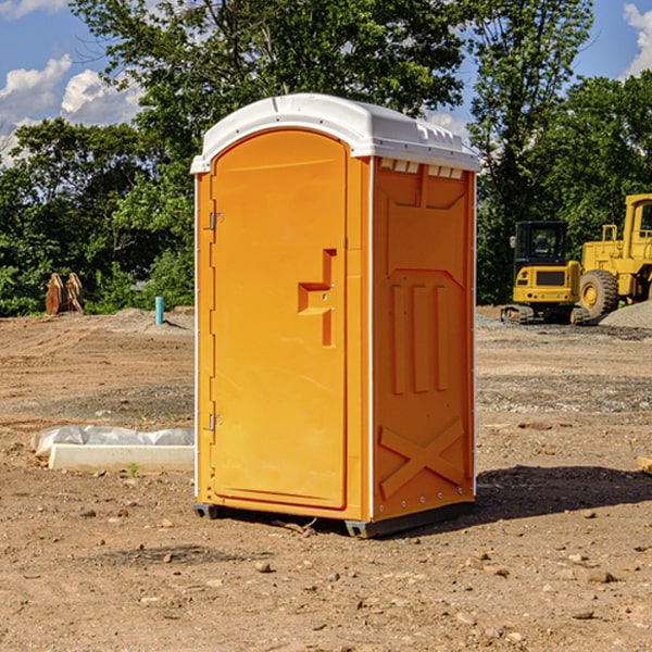 how often are the portable restrooms cleaned and serviced during a rental period in Herrings